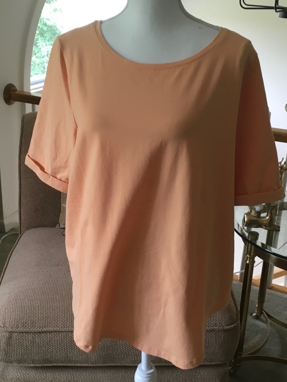 Chico’s size 2 (XL) peach-colored knit short sleeve top